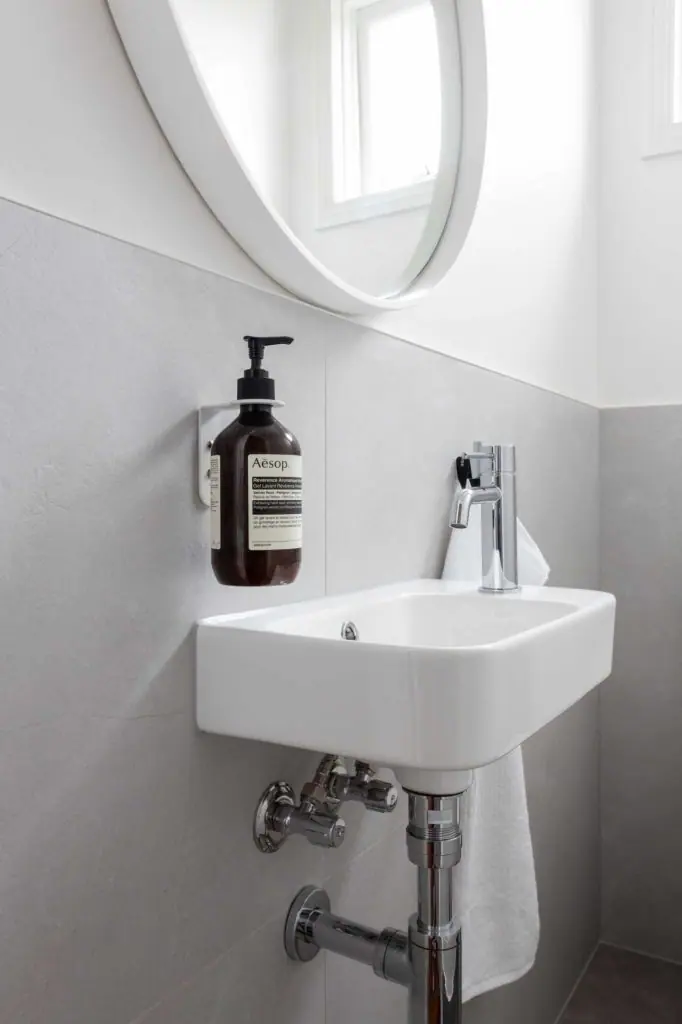 wall mounted bottle holder with wall mounted basin